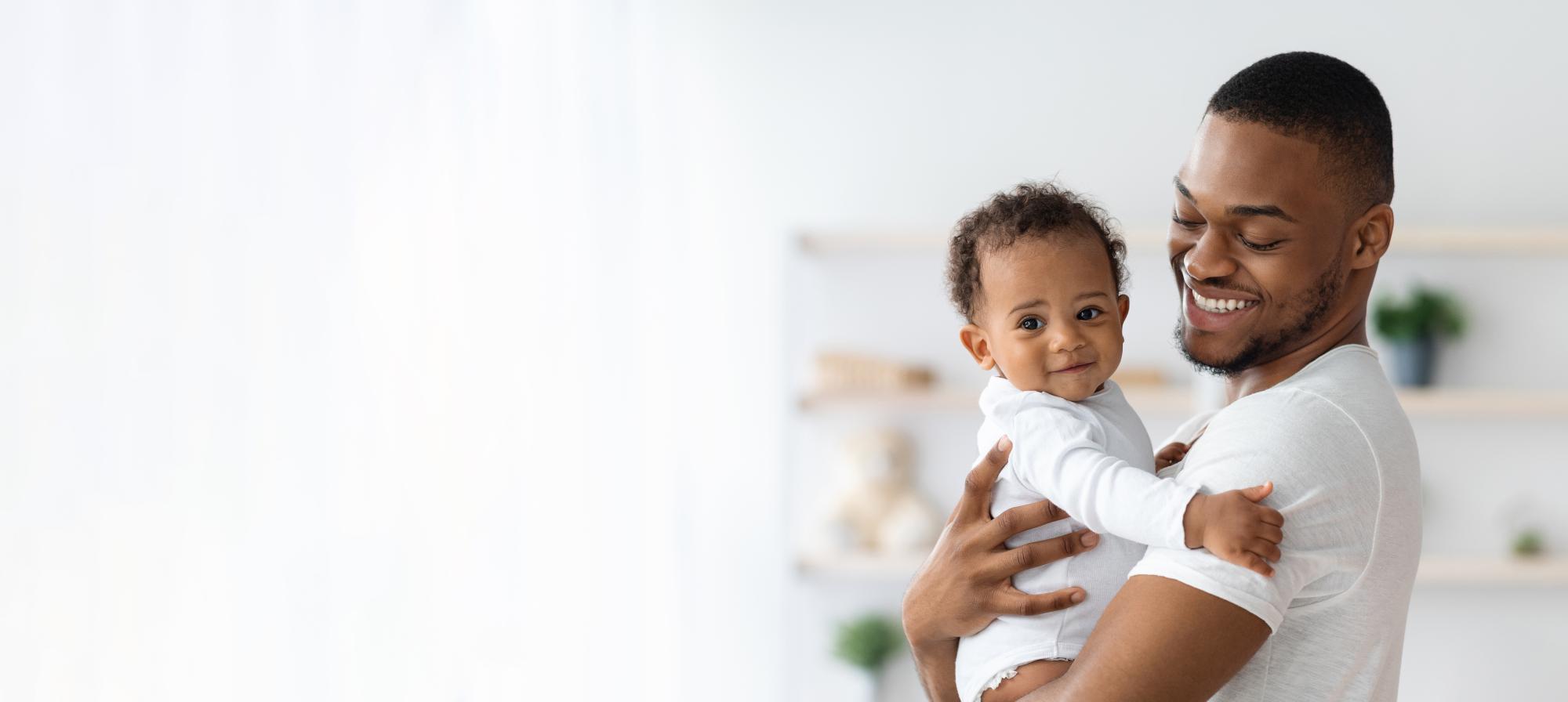 Man Holding Baby