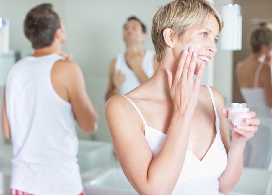 Woman putting on lotioncrop.jpg