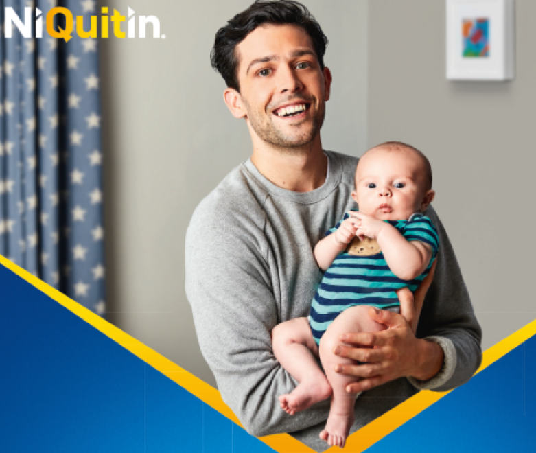 Man Holding Baby